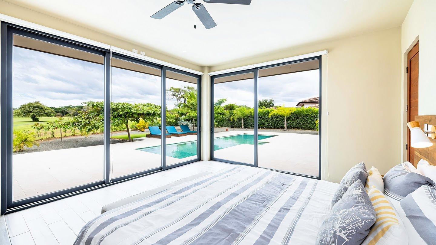 6966-The master bedroom with great views on the pool