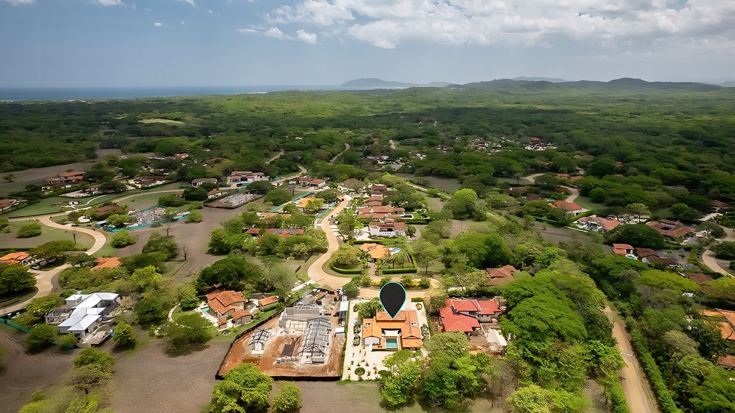 11158-Aerial view of the home within short distance of the ocean