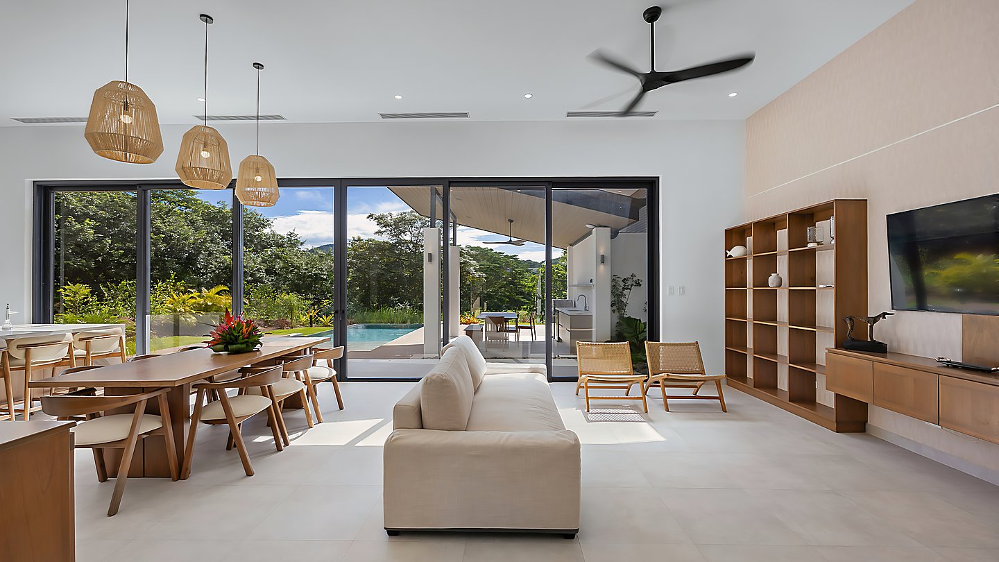 10998-The living room with large floor-to-ceiling windows