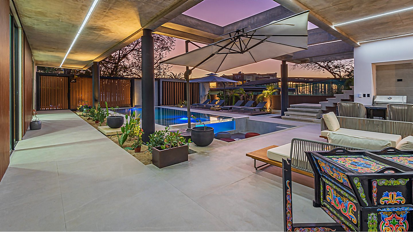 12294-The large outdoor living area around the pool