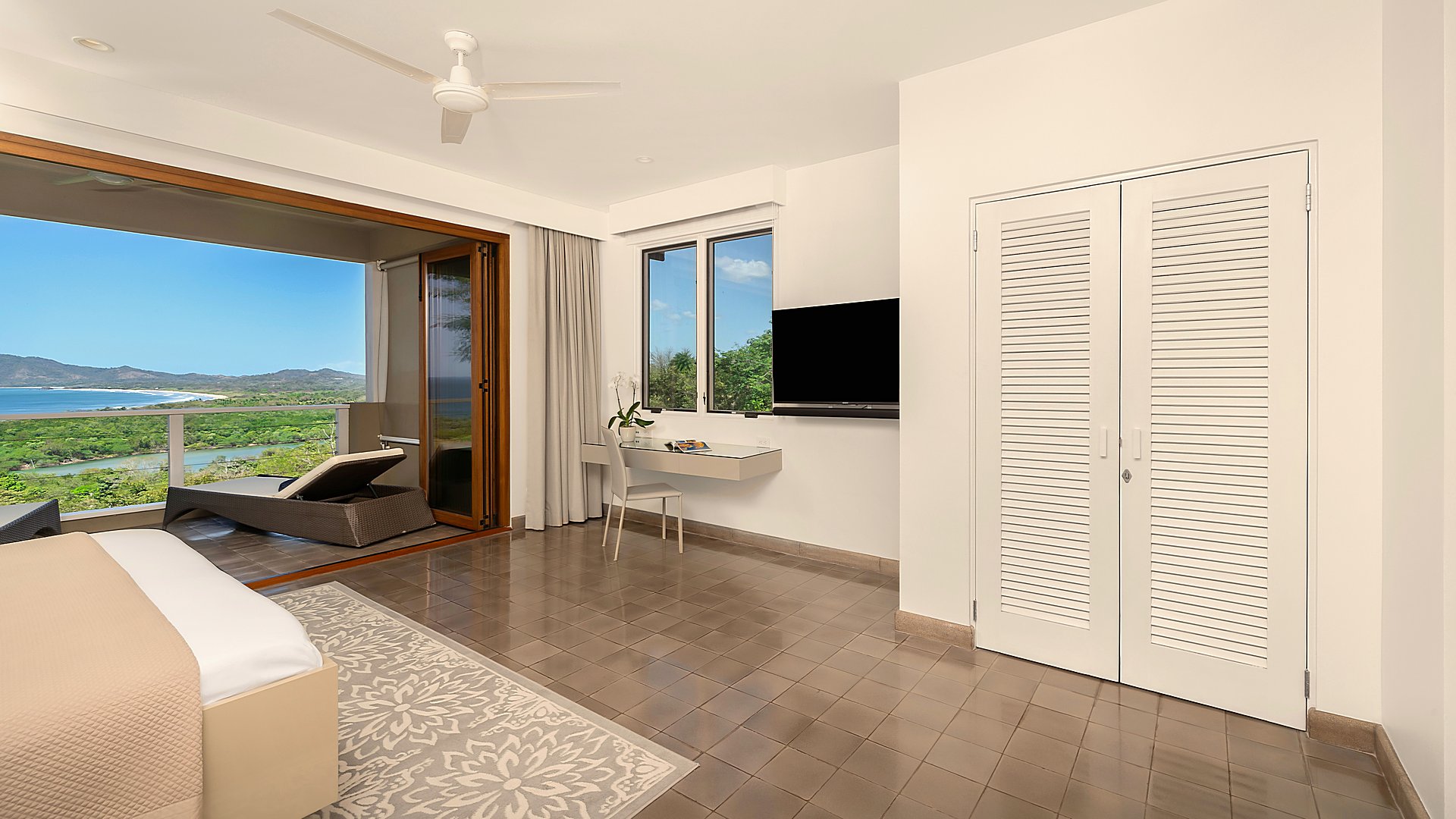 11645-Other view of the master bedroom with a desk