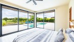 6966-The master bedroom with great views on the pool