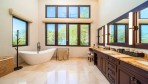 10938-One of the master bathrooms