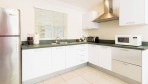 12263-One of the fully equipped kitchens