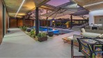 12294-The large outdoor living area around the pool