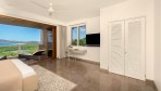 11645-Other view of the master bedroom with a desk