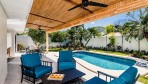 12361-The terrace with view on the pool and the garden