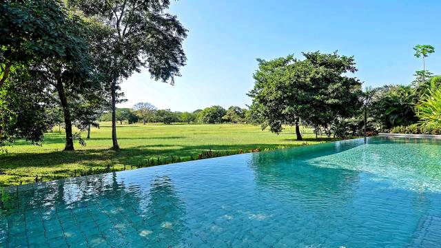Splendid estate for rent within the beach resort community of Hacienda Pinilla with incredible golf views...