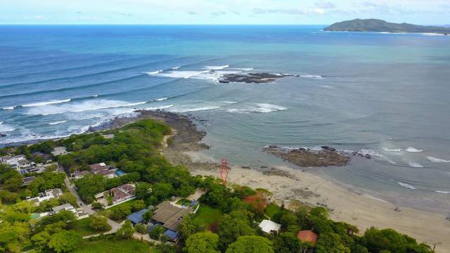 In Langosta, lot for sale with unobstructed ocean views and direct access to the beach!