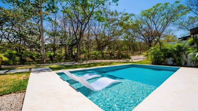 Home with a swimming pool for sale within a five-minute drive of Tamarindo.