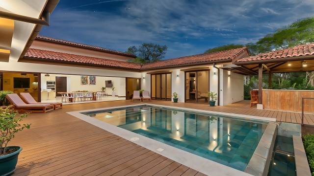 Home with a swimming pool for sale in the very nice gated community of Hacienda Pinilla...